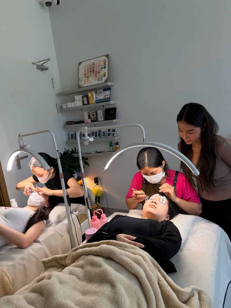 Students practising on models during a class at Shella Nails & Lashes